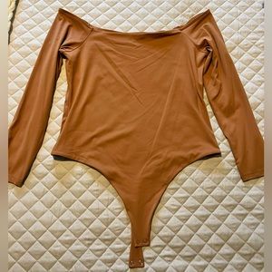 Nuuds XL off the shoulder bodysuit in the color Clay
